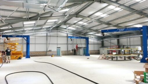 3 swing jib cranes on factory floor